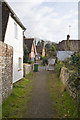 Footpath from the church emerges onto the A32, West Meon in GU32 1JJ
