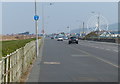 East along the A548 Rhyl Coast Road in LL18 3TH