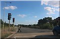 Man holds up the A43 in Kettering in NN14 1UE