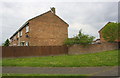 Wall, fence and housing on south side of Trent Road in NG31 7JS