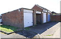 Garage blocks on NW side of Barton Square in NN18 0TB