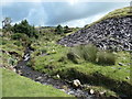Stream and slate tip at Glandwr in LL54 7RE