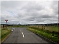 Minor roads junction near Whiteburn in TD11 3RZ