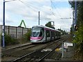 Midland Metro leaving Booth Street towards Wolverhampton in B66 2PU