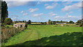 Two pillboxes in a field near Rushmere in NR34 7JZ