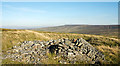 Curious stack of stones on moorland south of The Dodd's summit in NE47 8AF