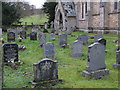 The churchyard of Holy Trinity Church, Whitfield in NE47 8YZ
