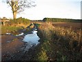 Muddy farm road after heavy rain in PH13 9ET