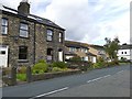 Houses old and new below Harrop Edge in OL3 5QJ