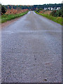 The road from Drum to Garlogie, looking north in AB32 6XA
