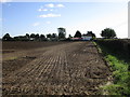 Prepared field and Sunnyside Farm in NG34 9EF