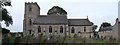 St Nicholas' Church and churchyard in NG33 4LN