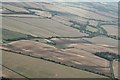 Crop and soilmarks alongside disused railway west of Withcall: aerial 2019 in Withcall