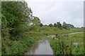 Flooded road at Rowlow Brook in DE45 1LR