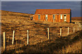 'Old tin kirk' at Dalsetter, Yell,  in autumn sunshine in ZE2 9DG