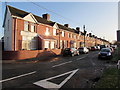 Long row of houses opposite Rhoose railway station in CF62 3AU
