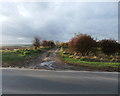 Muddy entrance to the cemetery in DN38 6EN