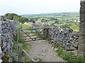 The Pennine Bridleway looking towards Settle in BD24 9LY