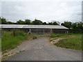 Field entrance and farm building, Middle Woodford in SP4 6NG