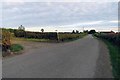 Wymeswold Road passing entrance to Church Site Farm in Thorpe in the Glebe