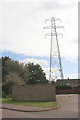 Garage block on Weymouth Close and electricity pylon in NN18 0TB