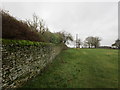 Bridleway alongside the garden wall of Grange Farm in Southorpe