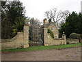 Ornamental gates and Oak Wood Cottage in Thornhaugh
