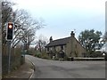 House by A358 at north end of Weycroft Bridge in EX13 7JJ