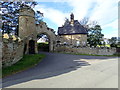 North Lodge and gateway to Gyrn Castle in CH8 9BQ