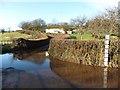 Flooding at the bottom of Dart Hill in EX16 8PU