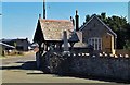 Lychgate and former schoolroom, Llandrinio in SY22 6SG