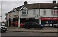 Shops on Rainham Road, South Hornchurch in RM13 7RP