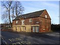 Former coach house converted into houses in DE15 0SZ