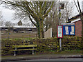 Bench, bus stop and village notice board, Whitley Road, Whitley Lower in WF12 0LZ
