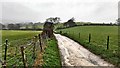 Track heading towards Poynings Grange Farm from the west in BN45 7AW