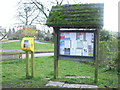 A notice board and a defibrillator in BA12 6LW