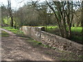 A bridge over the By Brook near Upper Long Dean Mill in SN14 7EW