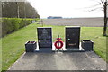 RAF Fowlmere memorials with a T2 hangar on the horizon in SG8 7QJ
