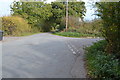 Road junction, Sandy Lane in TN26 3DP