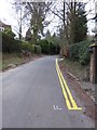 Road markings in Highercombe Lane in GU27 2LJ