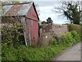 Old shed and old wall, Newcourt Road, Topsham in EX3 0FY