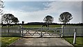 Gates and horses on the west side of the B2116 in BN6 9JL