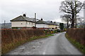 Houses near the Maen Beuno standing stone in SY21 8AE