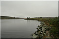 The tranquil waters of Clunas reservoir in IV12 5RG