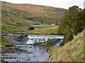Weir and bridge across the river in Strath Vaich in IV23 2QH