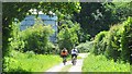Cyclists on the track near Limbourne Farm in RH20 1HT