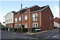New Brighton Avenue houses at Jack Hardy Close junction in LE7 2DJ