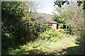 Overgrown outbuilding at No. 1580 Melton Road,'Staverton House' in LE7 3FQ