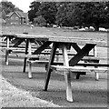 Deserted picnic tables in Car Colston