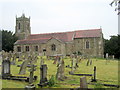 Church and churchyard in SY12 9EF